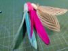 Picture of 3 PACK of fetch toys with bell, no bell and natural - variety pack - flies like a dart!